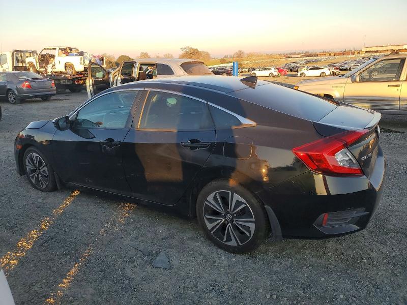 Photo 2 from auction – 2016 HONDA CIVIC EX with VIN 19XFC1F41GE206298