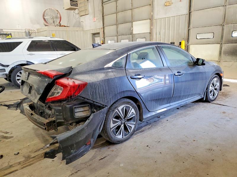 Photo 3 from auction – 2016 HONDA CIVIC with VIN 19XFC1F74GE016487