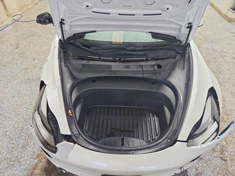 Photo 11 from auction – 2022 TESLA MODEL 3 with VIN 5YJ3E1EB9NF110603