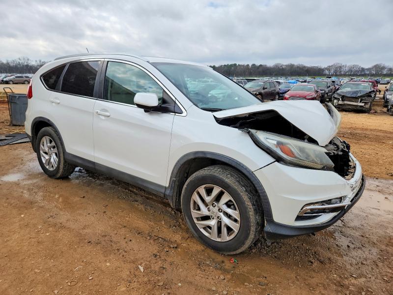 Photo 4 from auction – 2015 HONDA CR-V EXL with VIN 5J6RM3H74FL006660