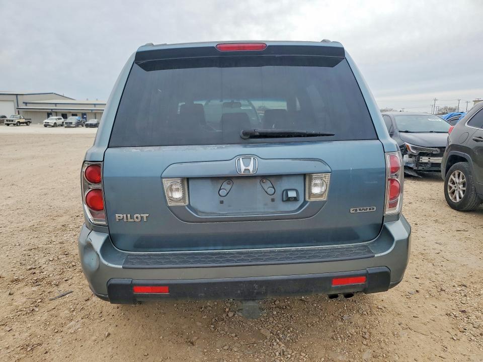 Photo 6 from auction – 2006 HONDA PILOT EX with VIN 2HKYF18716H539165