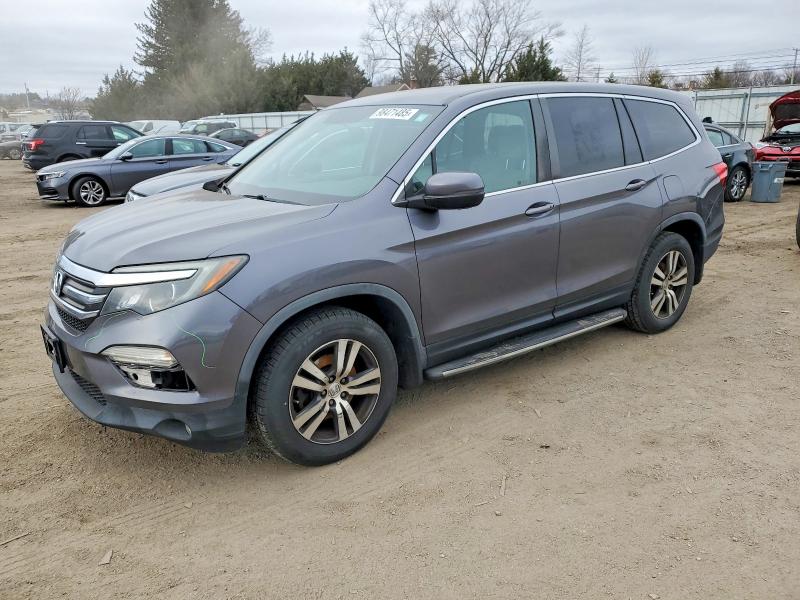 HONDA PILOT EX 2017 with VIN 5FNYF6H33HB063495 - Photo from auction