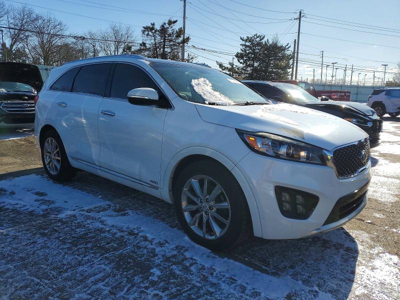 Photo 4 from auction – 2016 KIA SORENTO SX with VIN 5XYPKDA59GG020181