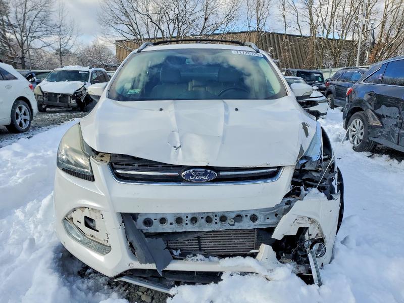 Photo 5 from auction – 2016 FORD ESCAPE TIT with VIN 1FMCU9J99GUB42137