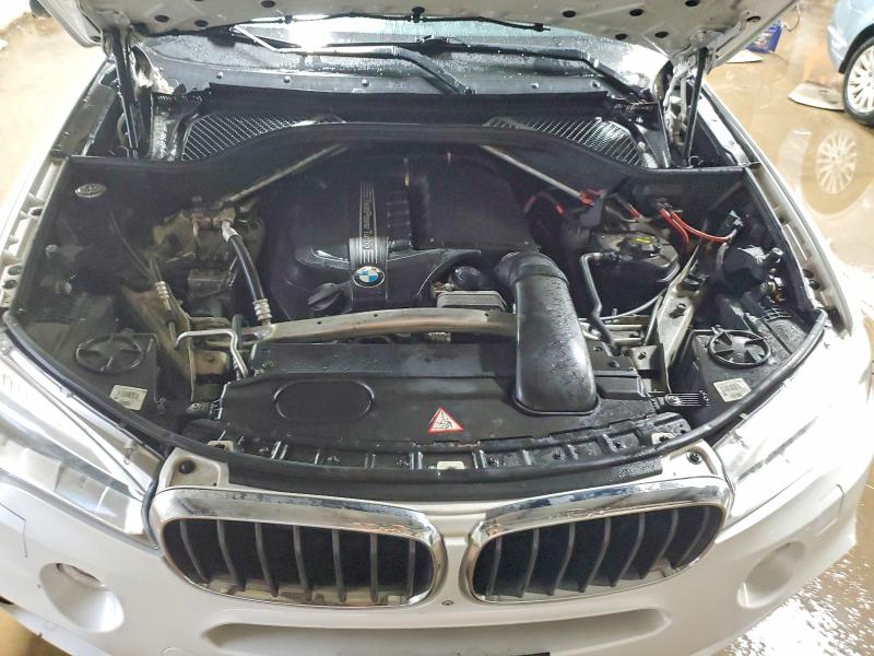 Photo 11 from auction – 2014 BMW X5 with VIN 5UXKR0C58E0H23545