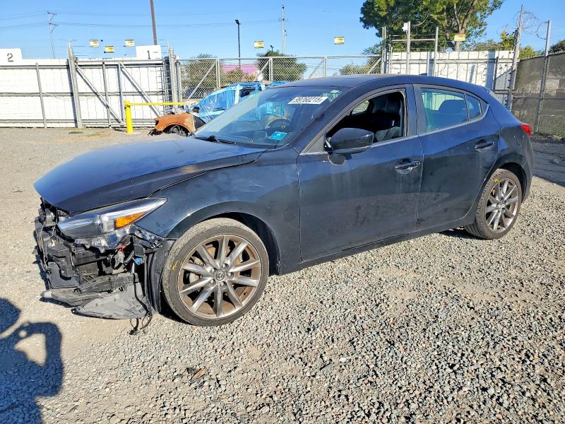 MAZDA 3 GRAND TO 2018 with VIN 3MZBN1M31JM170514 - Photo from auction