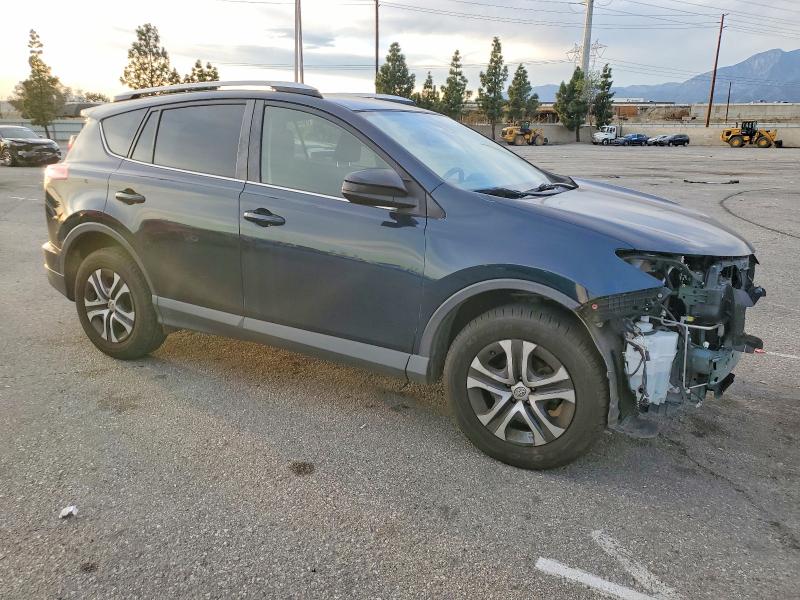 Photo 4 from auction – 2018 TOYOTA RAV4 with VIN JTMZFREV9JJ724697