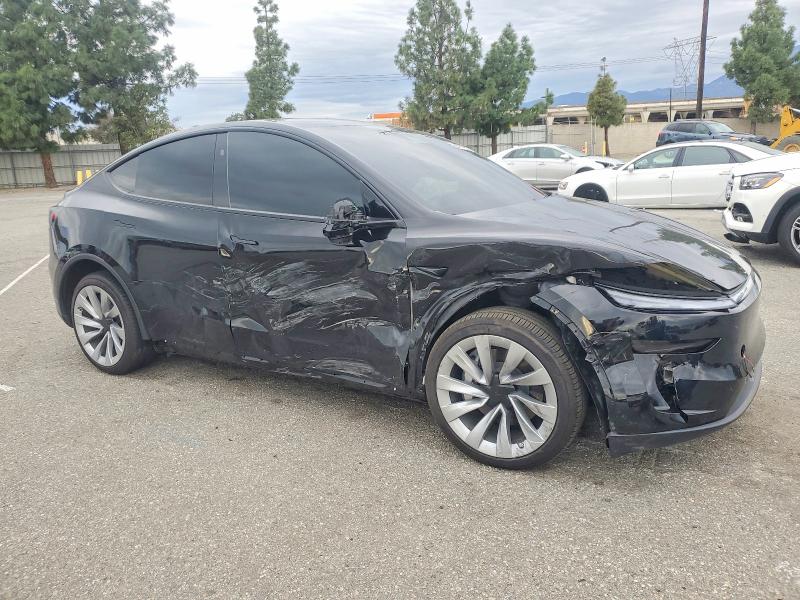 Photo 4 from auction – 2026 TESLA MODEL Y with VIN 7SAYGDED6TF388927