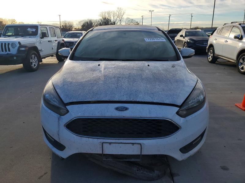 Photo 5 from auction – 2015 FORD FOCUS with VIN 1FADP3F24FL219046