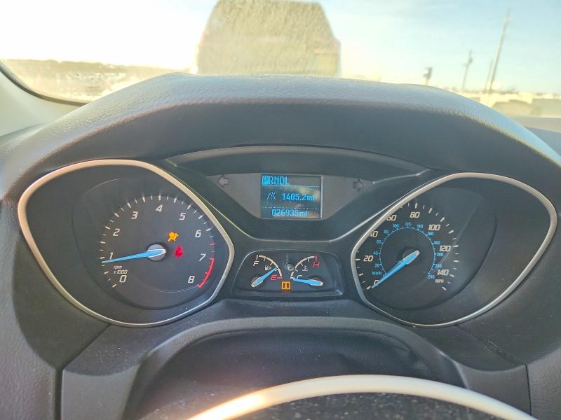 Photo 9 from auction – 2014 FORD FOCUS with VIN 1FADP3E2XEL316655
