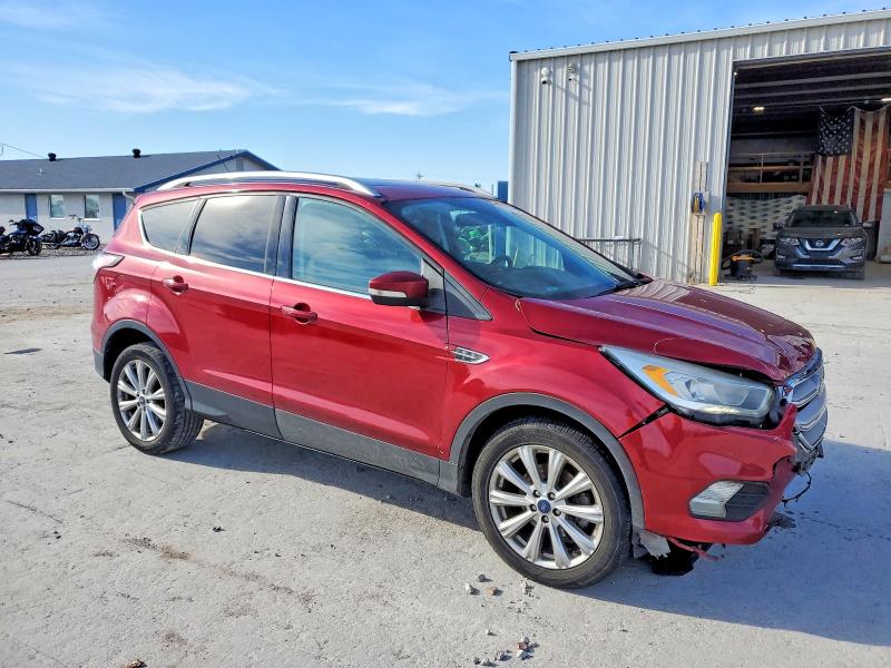 Photo 4 from auction – 2017 FORD ESCAPE TIT with VIN 1FMCU0JD0HUD34127