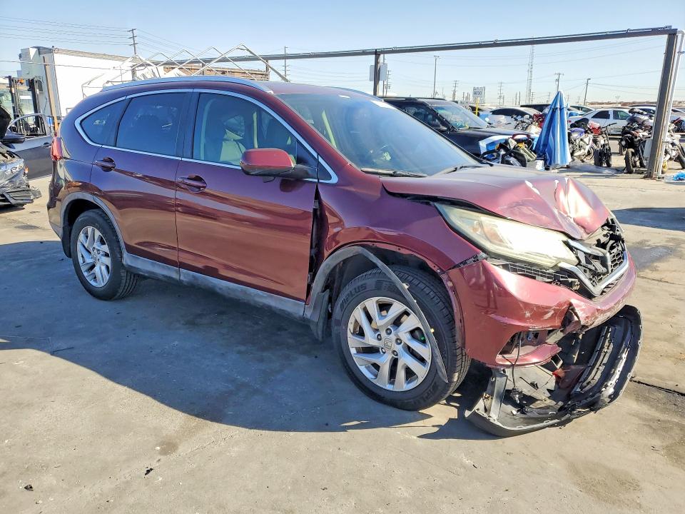 Photo 4 from auction – 2016 HONDA CR-V EXL with VIN 2HKRM3H79GH532570