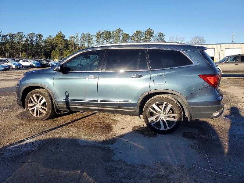 Photo 2 from auction – 2018 HONDA PILOT TOUR with VIN 5FNYF5H94JB015752