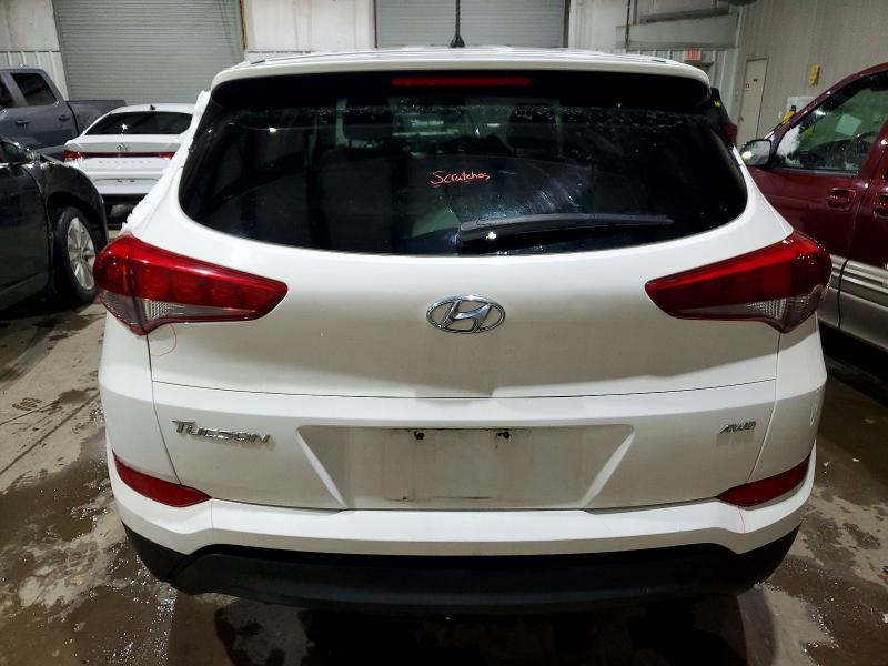 Photo 6 from auction – 2018 HYUNDAI TUCSON SE with VIN KM8J2CA48JU765223