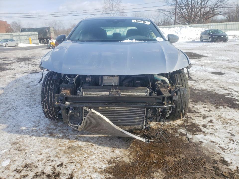 Photo 5 from auction – 2023 VOLKSWAGEN JETTA with VIN 3VWBM7BUXPM058787