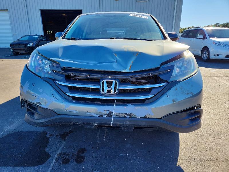 Photo 5 from auction – 2012 HONDA CR-V LX with VIN 5J6RM3H36CL013182