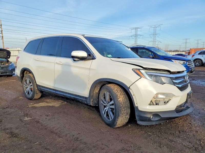 Photo 4 from auction – 2016 HONDA PILOT EXL with VIN 5FNYF6H50GB029045