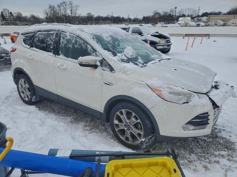 Photo 4 from auction – 2016 FORD ESCAPE TIT with VIN 1FMCU0JX2GUA19502