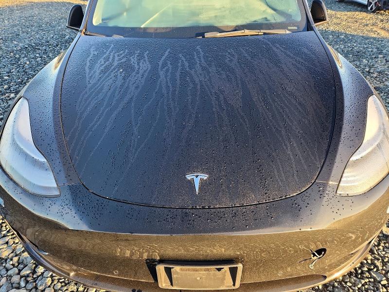 Photo 11 from auction – 2021 TESLA MODEL Y with VIN 5YJYGAEE6MF271788