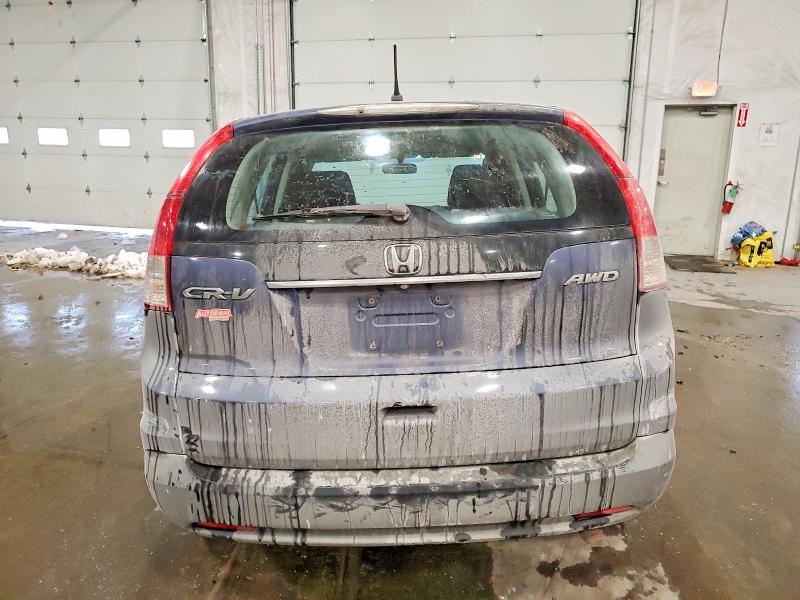 Photo 6 from auction – 2013 HONDA CR-V LX with VIN 2HKRM4H31DH650093