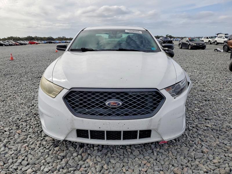 Photo 5 from auction – 2014 FORD TAURUS POL with VIN 1FAHP2L85EG161329