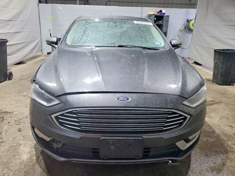 Photo 5 from auction – 2018 FORD FUSION TIT with VIN 3FA6P0D95JR241591