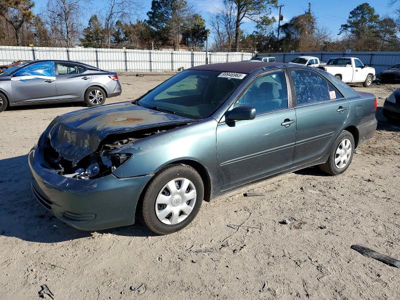 TOYOTA CAMRY LE 2002 with VIN 4T1BE32K72U611287 - Photo from auction