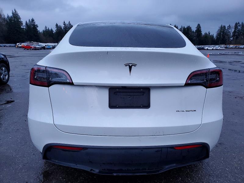 Photo 6 from auction – 2023 TESLA MODEL Y with VIN 7SAYGDEE3PF815477