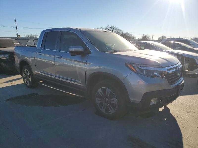 Photo 4 from auction – 2018 HONDA RIDGELINE with VIN 5FPYK3F61JB015921