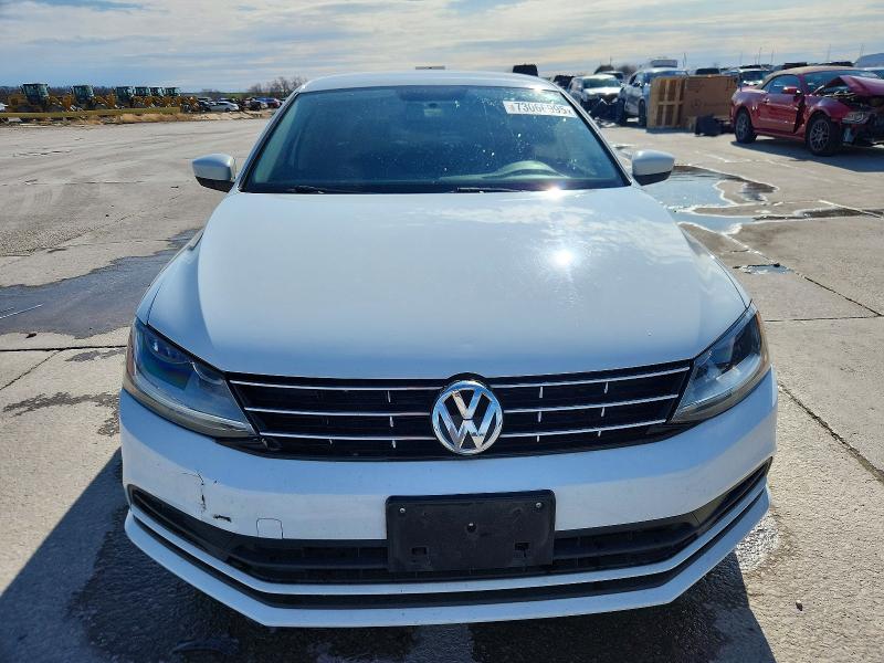 Photo 5 from auction – 2018 VOLKSWAGEN JETTA S with VIN 3VW2B7AJ2JM251973