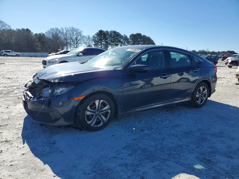 HONDA CIVIC LX 2017 with VIN 19XFC2F5XHE065943 - Photo from auction