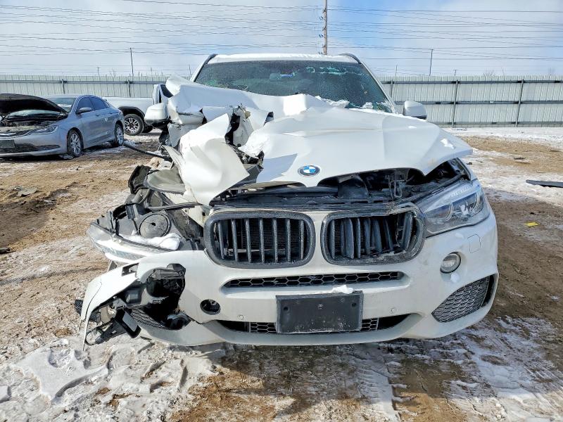 Photo 5 from auction – 2014 BMW X5 XDRIVE3 with VIN 5UXKR0C56E0H28498