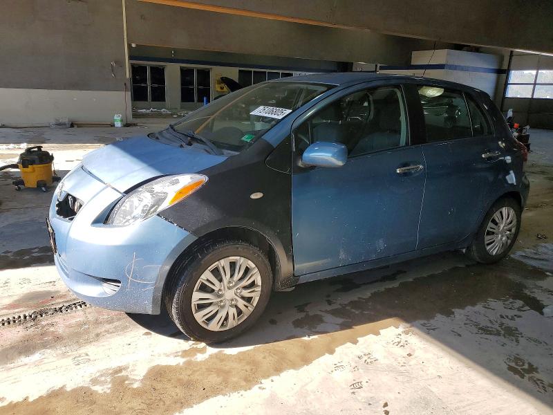TOYOTA YARIS 2009 with VIN JTDKT903095230815 - Photo from auction