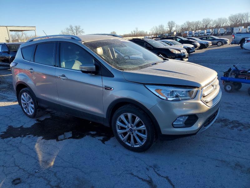 Photo 4 from auction – 2017 FORD ESCAPE TIT with VIN 1FMCU0JD9HUA36868
