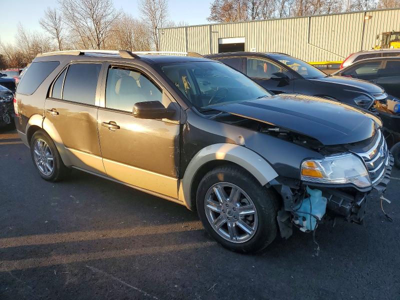Photo 4 from auction – 2008 FORD TAURUS X E with VIN 1FMDK08W18GA12452