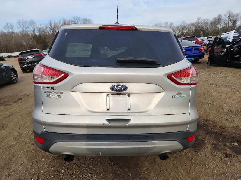 Фото 6 с аукциона – 2014 FORD ESCAPE с VIN 1FMCU0G95EUA34095