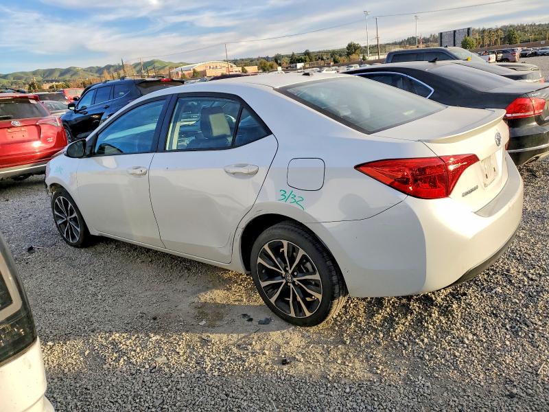Photo 2 from auction – 2017 TOYOTA COROLLA L with VIN 5YFBURHE5HP597200