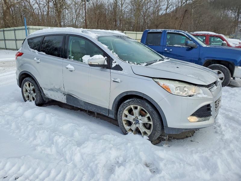 Photo 4 from auction – 2014 FORD ESCAPE TIT with VIN 1FMCU9J91EUD52745