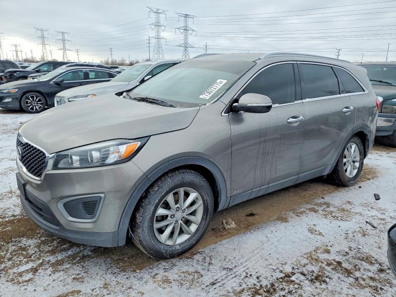 KIA SORENTO LX 2016 with VIN 5XYPGDA35GG057132 - Photo from auction