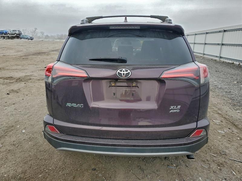 Photo 6 from auction – 2017 TOYOTA RAV4 XLE with VIN 2T3RFREV9HW664190