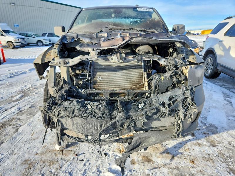Photo 5 from auction – 2023 RAM 1500 CLASS with VIN 3C6RR7KGXPG673116