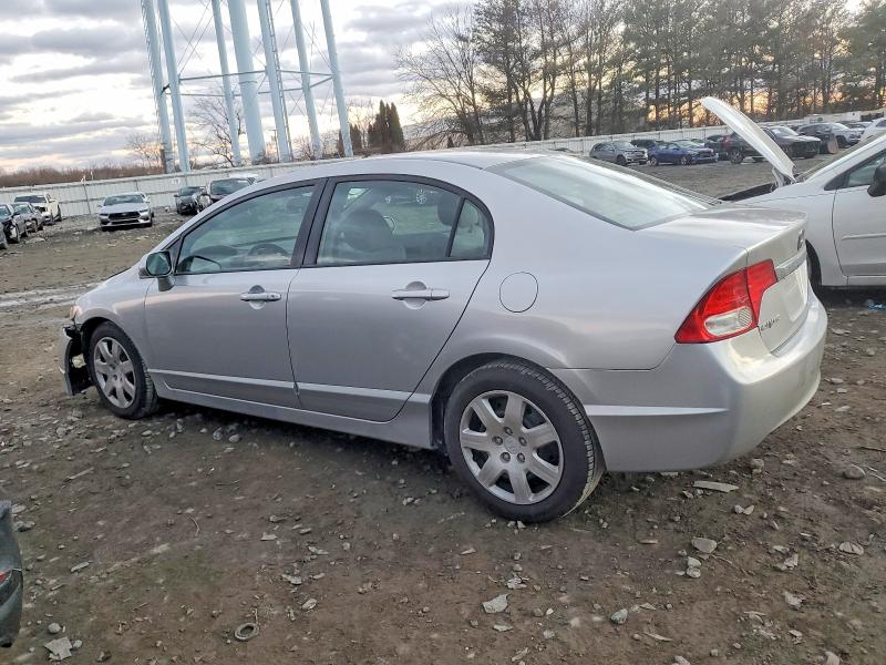 Photo 2 from auction – 2011 HONDA CIVIC LX with VIN 2HGFA1F52BH510804