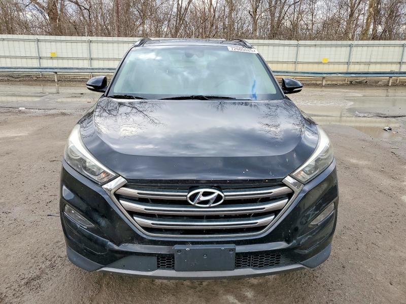Photo 5 from auction – 2016 HYUNDAI TUCSON LIM with VIN KM8J33A20GU262211