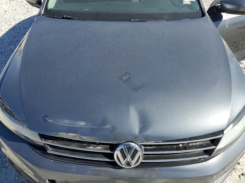 Photo 11 from auction – 2018 VOLKSWAGEN JETTA S with VIN 3VW2B7AJ4JM249691
