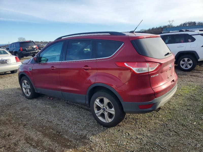 Photo 2 from auction – 2015 FORD ESCAPE with VIN 1FMCU9G98FUA53052