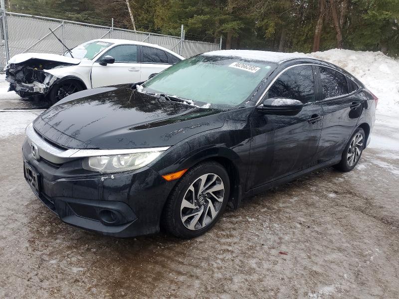 HONDA CIVIC EX 2017 with VIN 2HGFC2F81HH041028 - Photo from auction