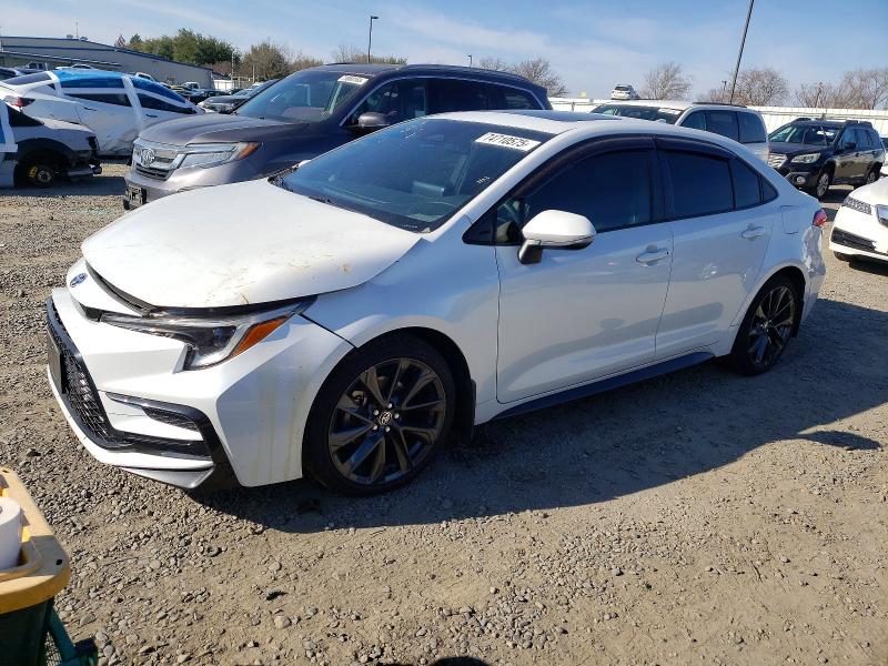TOYOTA COROLLA HYBRID 2023 with VIN JTDBCMFE7P3000659 - Photo from auction