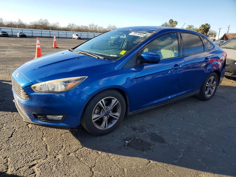FORD FOCUS 2018 with VIN 1FADP3F26JL241445 - Photo from auction
