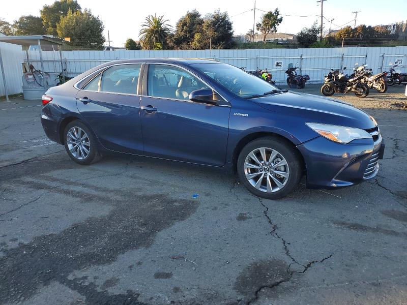 Photo 4 from auction – 2016 TOYOTA CAMRY HYBR with VIN 4T1BD1FK1GU198260