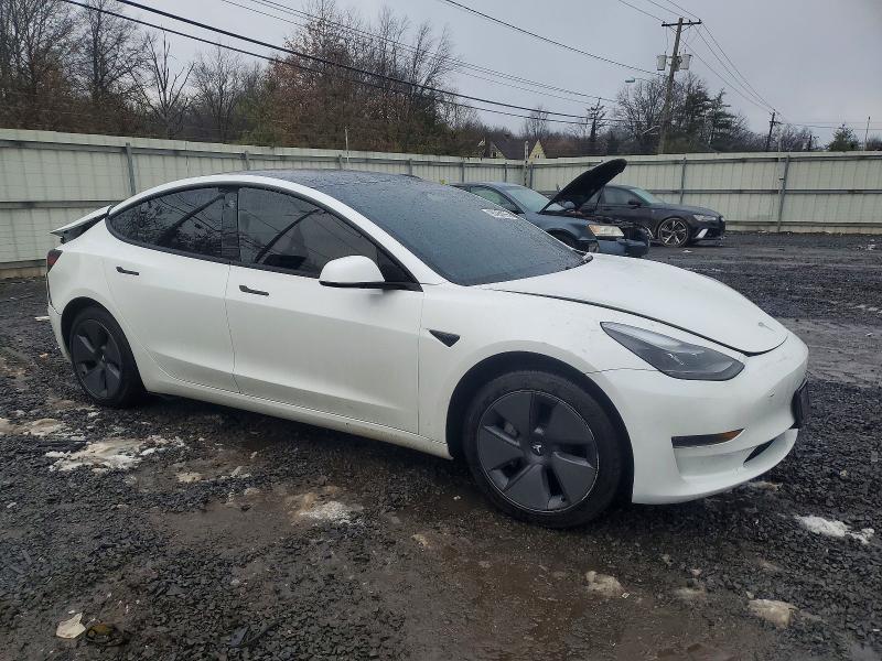 Photo 4 from auction – 2023 TESLA MODEL 3 with VIN 5YJ3E1EA8PF506810
